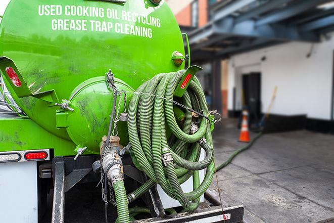 grease trap pumping truck servicing a restaurant in Centreville, VA